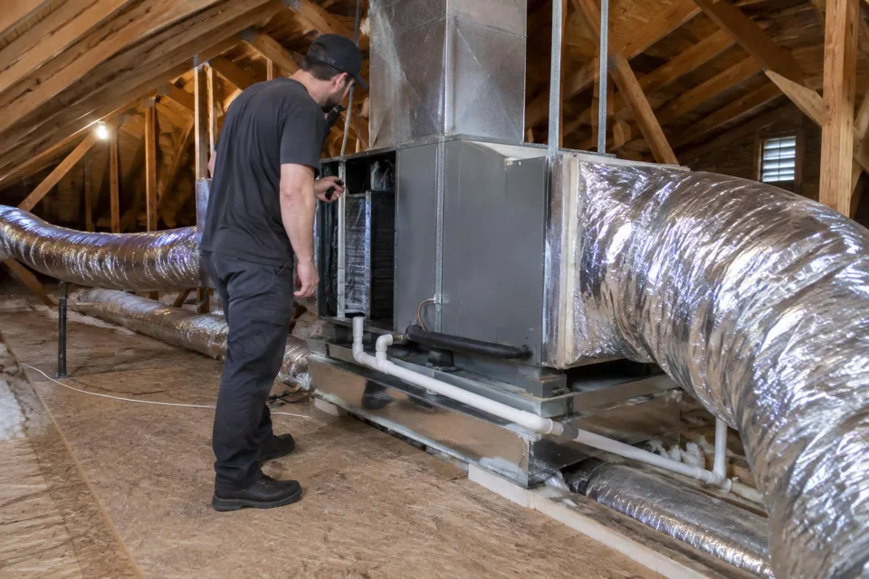 Generated illustration of a technician inspecting an air handler and ductwork in an attic in Baton Rouge, Louisiana